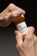 Opening prescription bottle, vertical