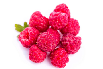 Ripe raspberries isolated on a white