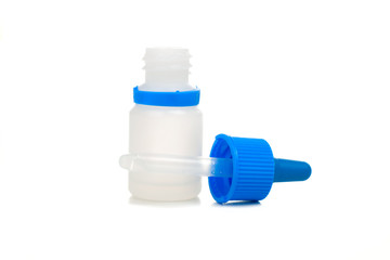 Opened white plastic bottle with a blue cap-dropper
