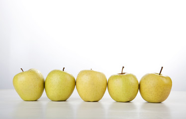 apple row on white background