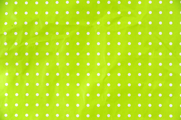 lime green paper with white dots