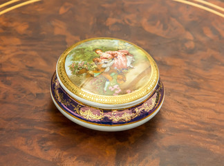 old porcelain box with beautiful drawings