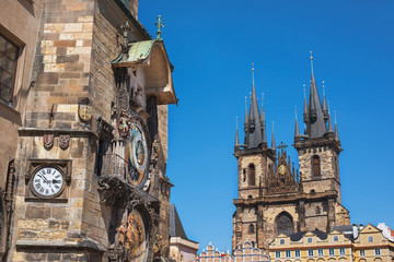 Fototapeta na wymiar Astronomical clock of in Prague with Tyn church