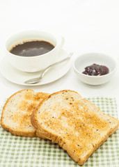 Toasted bread and toaster for breakfast.