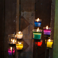 colorful candles in the glass