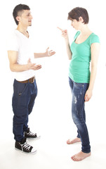 Fototapeta premium Young man and woman arguing isolated on white background