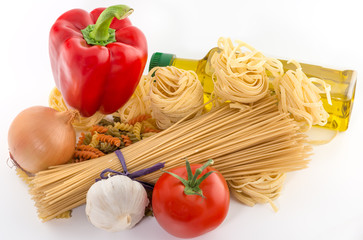 Pasta spaghetti, vegetables and spices, isolated on white