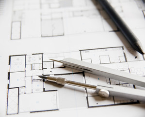 plan d'architecte et compas de mesures