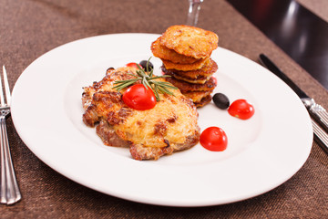 meat with potato pancakes