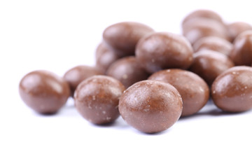 Brown dragee, in chocolate covered.