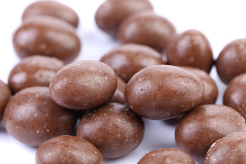 Brown dragee, in chocolate covered.