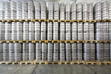 The wall of beer kegs in stock brewery