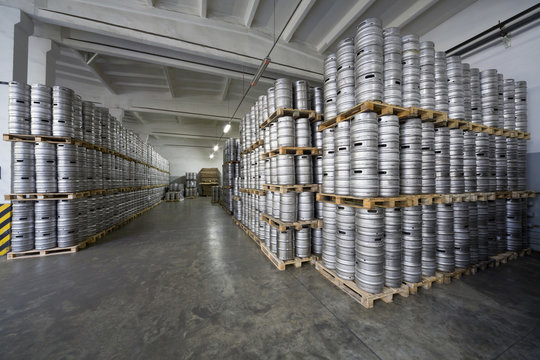 Rows of beer kegs in stock brewery