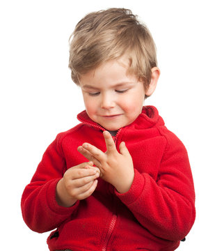 Toddler boy counting with fingers
