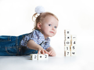 Little girl playing with blocks