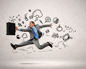 Jumping young businessman