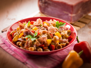 pasta with capsicum and parma ham, selective focus