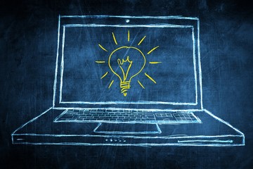Sketch netbook computer screen concept with idea light bulb