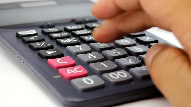 Businessman using a calculator