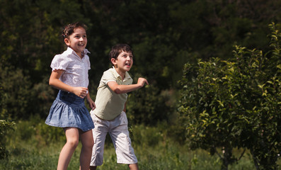 Multi-ethnic children playing ball