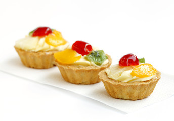 delicious fresh fruit tarts with focus in front
