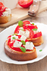 bruschetta with tomato, feta and basil