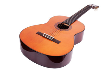 Wooden acoustic guitar on white background