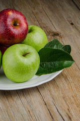 Apples in a ceramic white plate
