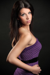 Fototapeta premium Beautiful brunette in the studio