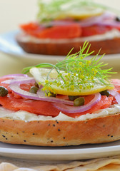 Smoked salmon lox on poppy seed onion bagel