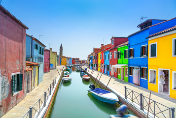 Venice landmark, Burano island canal, houses and boats, Italy
