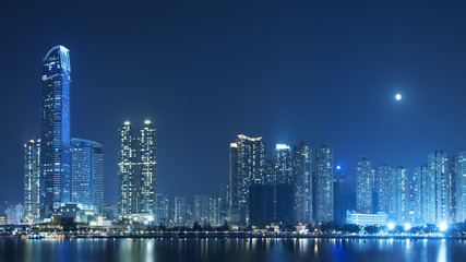 Fototapeta premium Full moon over Hong Kong City