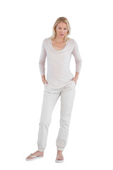 Concentrating woman with hands in pockets