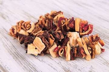 Dried mushrooms on wooden background