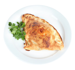 Pizza calzone on table isolated on white