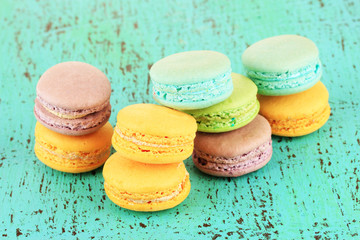 Macaroons on wooden table close-up