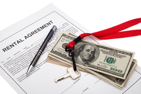 House key and cash with rental agreement