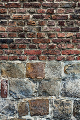 Stone brick wall in vertical position