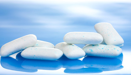 chewing gums on blue background