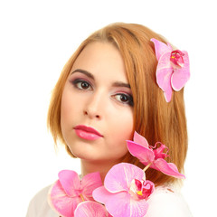 portrait of sexy young woman with pink orchid flower
