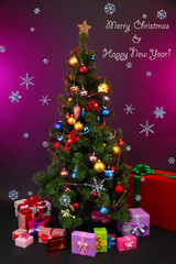 Decorated Christmas tree with gifts on purple background