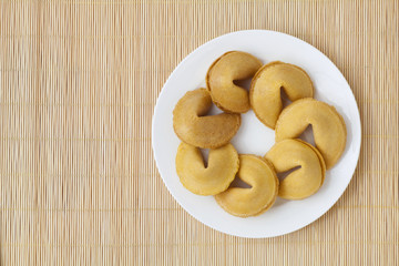 Fortune cookies on white plate