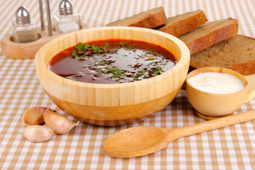 Delicious borsch on table close-up