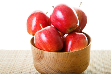 Red Apples in Wood Bowl on White Background