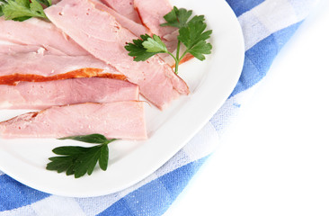 Bacon on plates on napkin isolated on white