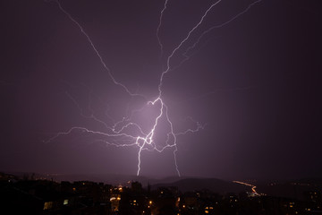 Beautiful powerful lightning over city