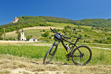 Mountain bike in green landscape