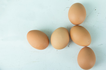 eggs on a wood blue table