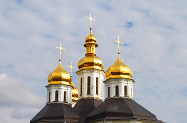 Fototapeta na wymiar Domes of Ekateriniska church in Chernigov, Ukraine - monument of