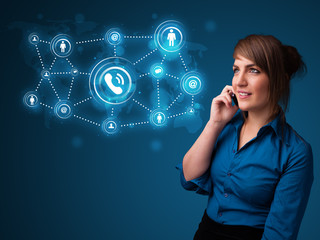 Pretty girl making phone call with social network icons